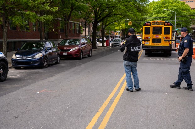 A 13-year-old boy suffered serious head injuries when he was struck by a blue Nissan Versa that was driving southbound on 15th Ave. at 38th St. in Brooklyn on Friday, May 8, 2026. (Theodore Parisienne / New York Daily News)
