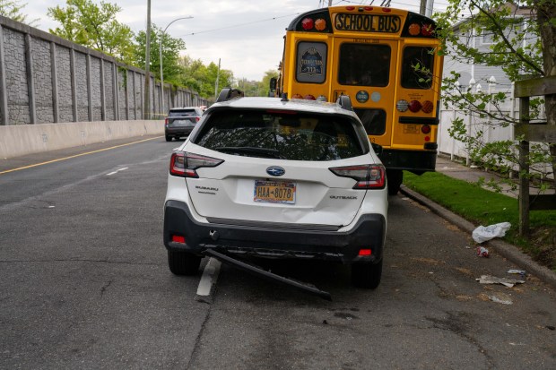 Police investigate after a man operating a black Chevy Tahoe SUV eastbound on Gannon Ave. South was killed after he lost control of the vehicle and crashed it into multiple vehicles between Ardmore Ave. and Sheraden Ave. in Staten Island on Saturday, May 2, 2026. (Theodore Parisienne / New York Daily News)