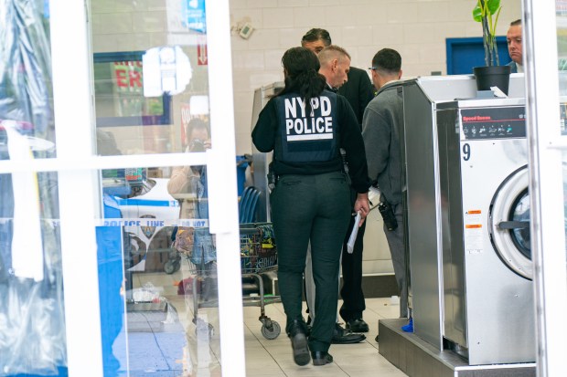 A 41yr old man was pronounced dead at Kings County Hospital after he was shot whilst doing his laundry inside of the Xpress Laundromat at 1809 Utica Avenue at the corner of Avenue J in Brooklyn on Monday May 25, 2026. 0933. A 68yr old man, who suffered a graze wound at the same location, was also taken to an area Hospital. (Theodore Parisienne / New York Daily News)