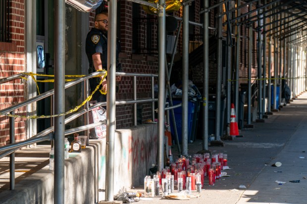 Police investigate after one person was shot in the hand and eight people were arrested after more than a dozen shots were fired outside an apartment building on Ralph Ave. near East New York Ave. in Brownsville, Brooklyn, early Saturday, May 30, 2026. (Theodore Parisienne / New York Daily News)