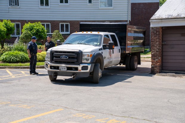 Police investigate after a 70-year-old man was fatally struck by a truck backing out of a parking spot in a lot near Hillside Ave. in Queens on Monday, May 18, 2026. (Theodore Parisienne / New York Daily News)