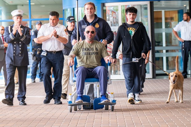 FDNY Fire Marshal Christopher Cuccaro, injured in an explosion aboard a barge last Friday, addressed the media before being wheeled out of the Staten Island University Hospital North Campus in Staten Island on Thursday, May 28, 2026. (Theodore Parisienne / New York Daily News)