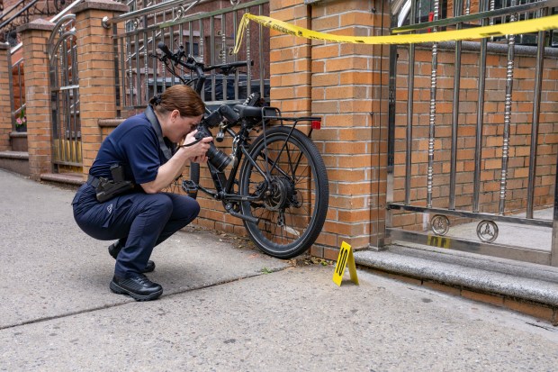 Police investigate after a 35-year-old man was fatally stabbed and a second man was slashed on 6th Ave. near 50th St. in Sunset Park, Brooklyn early Thursday, May 28, 2026. The suspect, who was also injured in the clash, left a blood trail down 6th Ave. (Theodore Parisienne / New York Daily News)