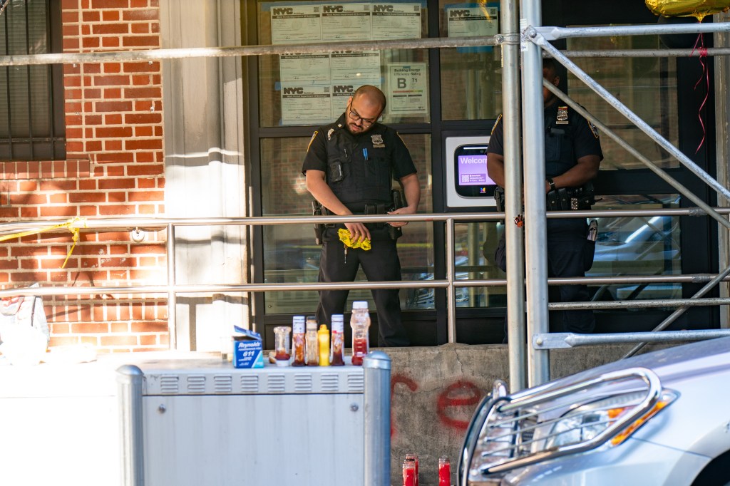 One shot, eight arrested, after gunfire erupts near makeshift memorial on Brooklyn street