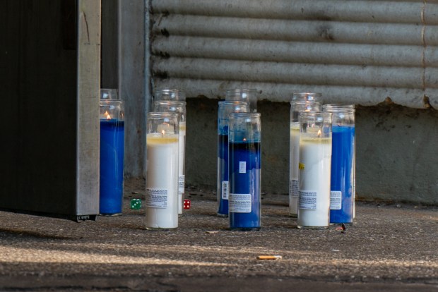 A candle memorial is pictured after a 23-year-old man was pronounced dead at Jacobi Hospital after he was shot in the chest on Sampson Ave. in the Bronx on Saturday, Aug. 2, 2025. (Theodore Parisienne / New York Daily News)