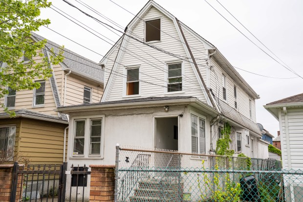 A man was pronounced dead on scene after a fire broke out inside a residence at 94-44 Lefferts Boulevard in Queens on Thursday May 7, 2026. 0739. (Theodore Parisienne / New York Daily News)