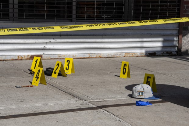 NYPD detectives and officers investigate a double-stabbing on 9th Ave. near W. 52nd St. in Manhattan on Thursday, April 23, 2026. (Barry Williams/ New York Daily News)