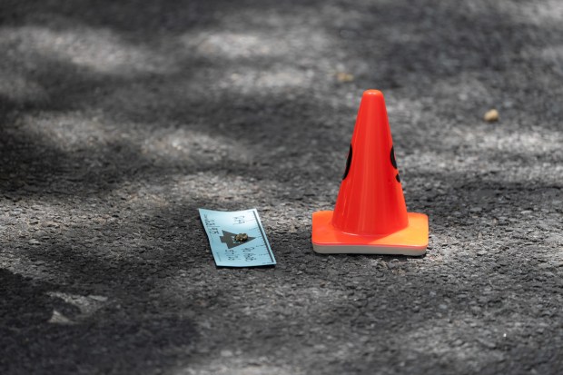 NYPD officers and detectives investigate a shooting at E. 7th St. near Avenue D in Manhattan on Thursday, May 7, 2026. (Barry Williams/ New York Daily News)