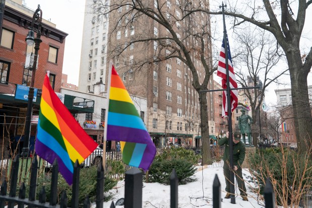 A National Park Service employee raises the U.S. Flag at the Stonewall National Monument Wednesday, Feb. 11, 2026 in Manhattan, New York. 