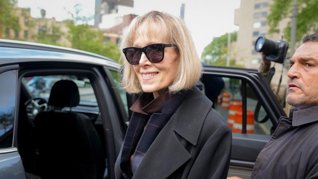 Former advice columnist E. Jean Carroll, left, leaves Manhattan federal court, Thursday, May 4, 2023, in New York. (AP Photo/John Minchillo, File)