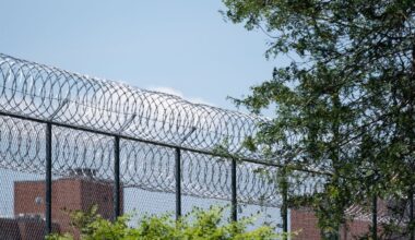 barbed wire fence outside mid-state correctional facility