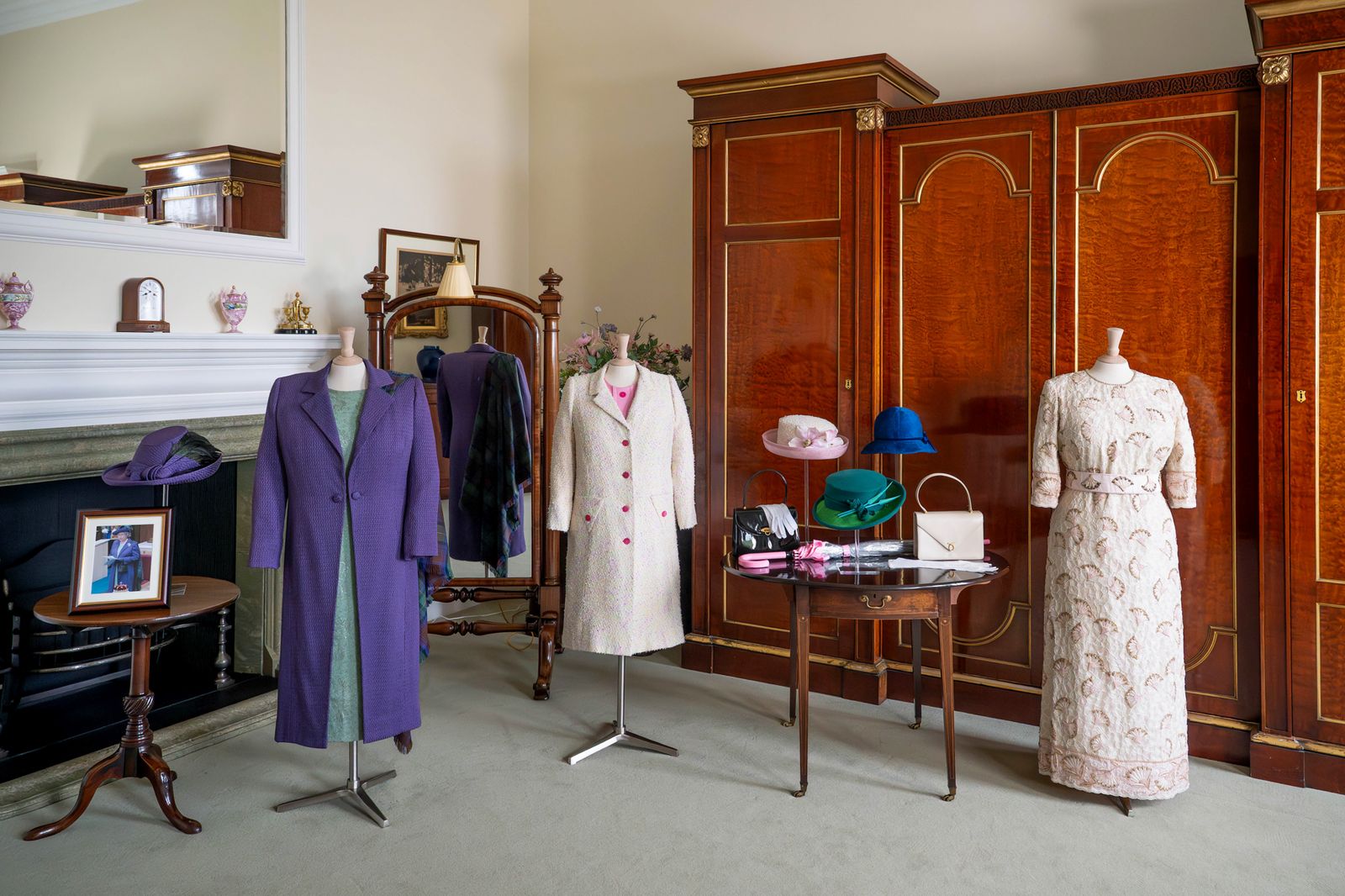 Image may contain Clothing Coat Dressing Room Indoors Room Furniture Accessories Bag and Handbag