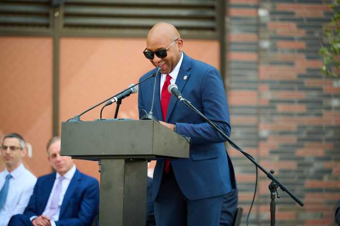 Queens Borough President Donovan Richards speaks at the official opening of Willets Point Commons. Photo via Queens Development Group.