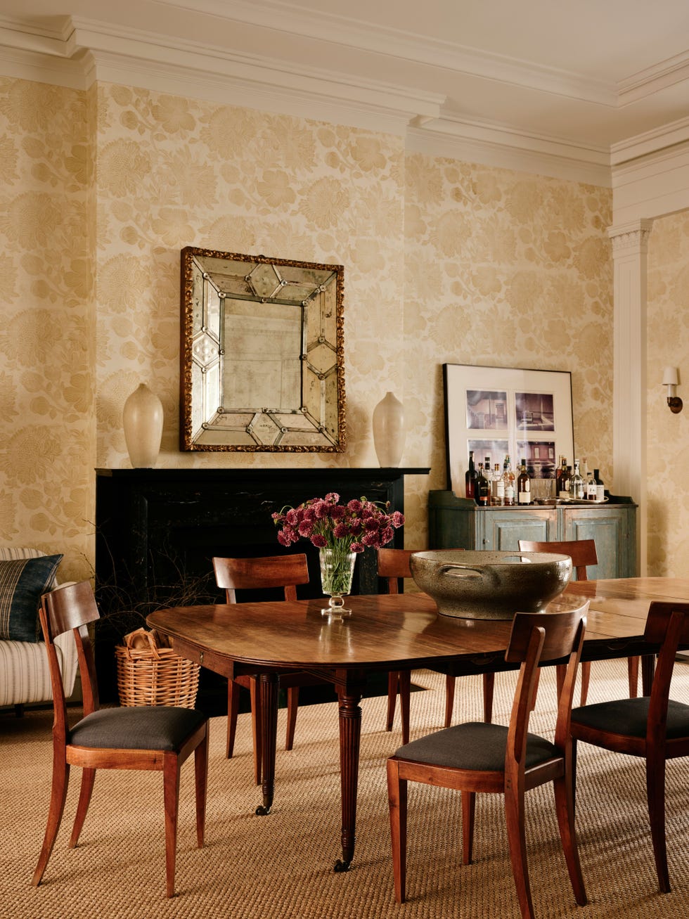Elegant dining room with table and chairs arranged for a meal