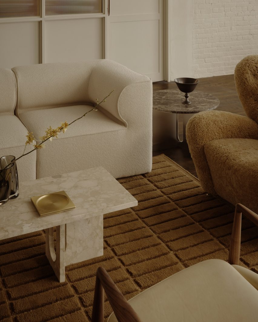 Furniture and decor accessories styled as they might be in a residential space