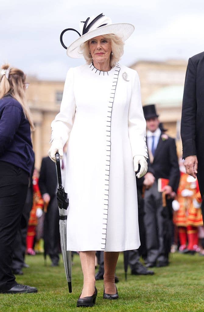 Queen Camilla attends a Royal Garden Party at Buckingham Palace on May 12, 2026 in London, England with a special brooch