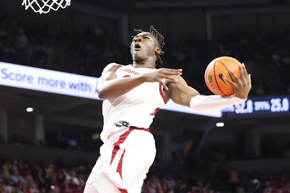 Nov 22, 2024; Fayetteville, Arkansas, USA; Arkansas Razorbacks forward Adou Thiero (3) goes up for a dunk in the second half against the Little Rock Trojans at Bud Walton Arena. Arkansas won 79-67. Mandatory Credit: Nelson Chenault-Imagn Images