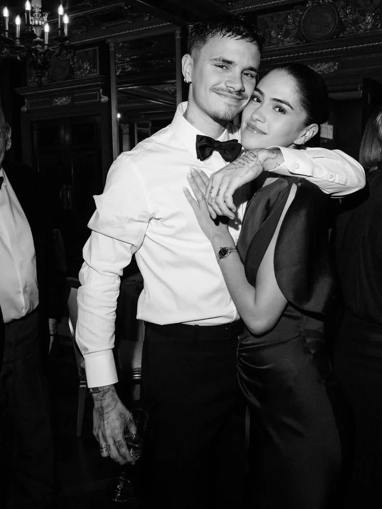 Romeo Beckham with his partner Kim Turnbull