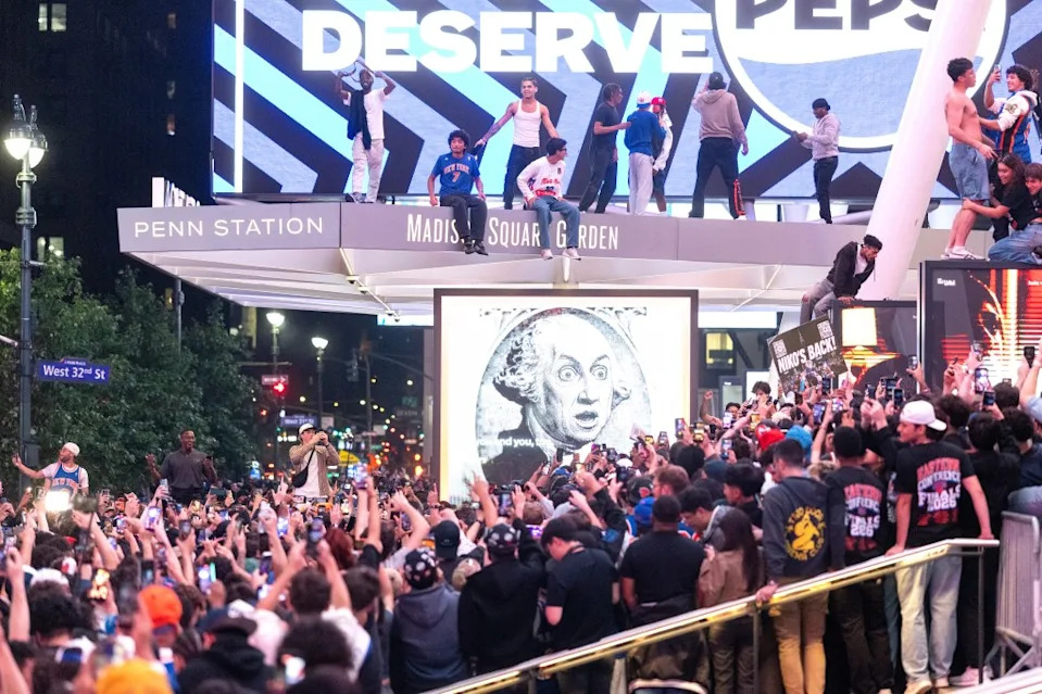 Members of the rowdy crew climbed on the arena’s iconic marquee. Aristide Economopoulos for NY Post