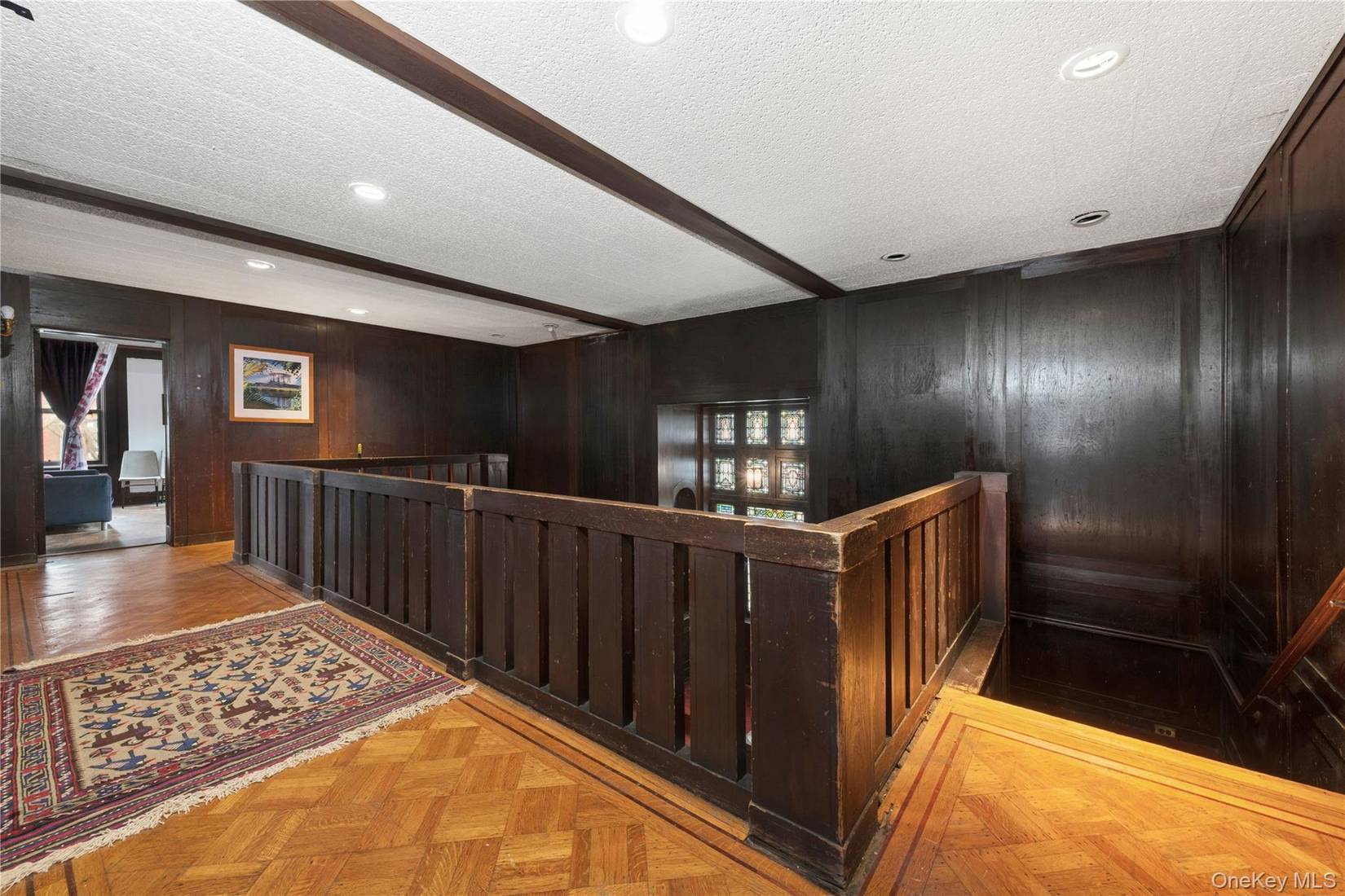 upstairs hall with wood floor