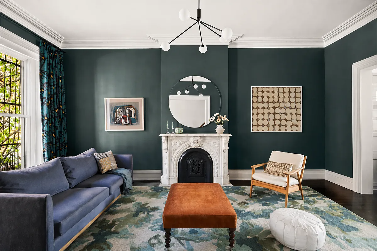 parlor with marble mantel, blue walls