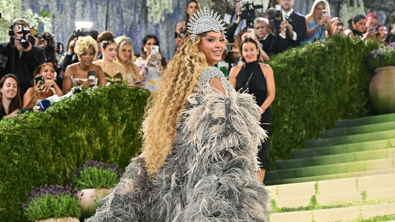 Met Gala guests take artistic liberties with dress code