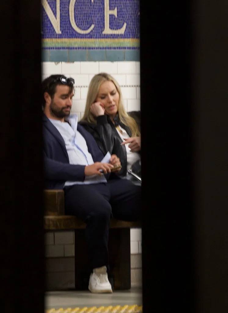 Vonn, 41, and Bailet, 30, sat close together as they waited for a train (seen above). BACKGRID