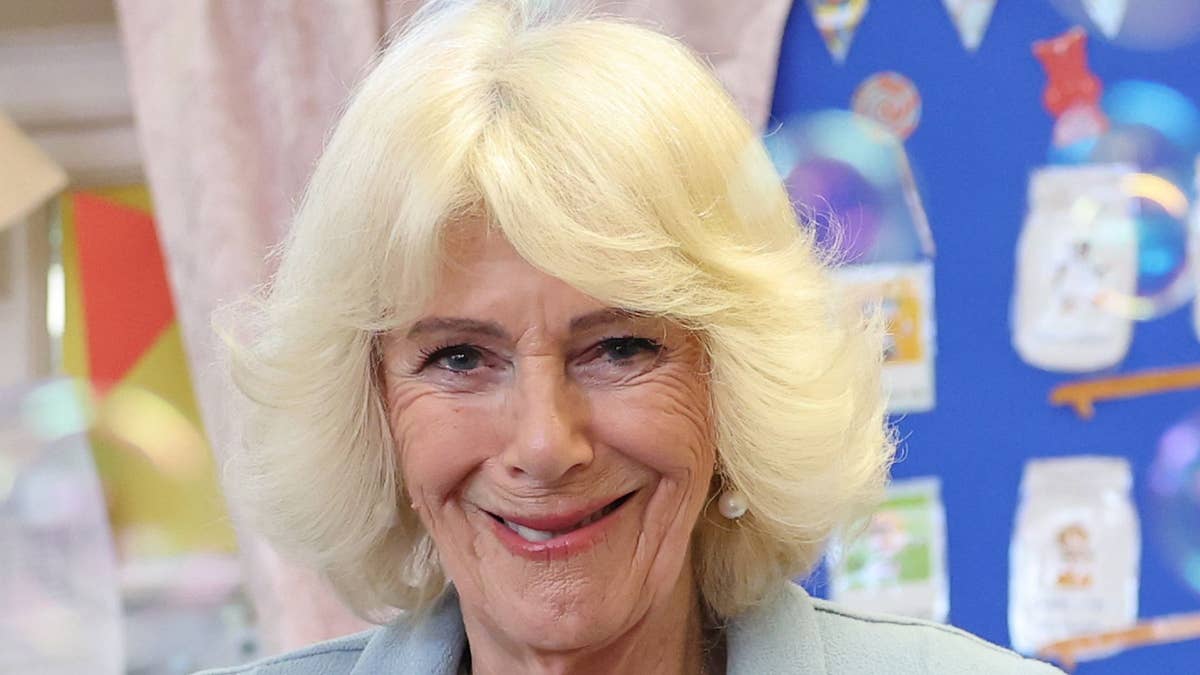 Queen Camilla braves Belfast rain in Chanel heels – and £5k Lady Dior bag