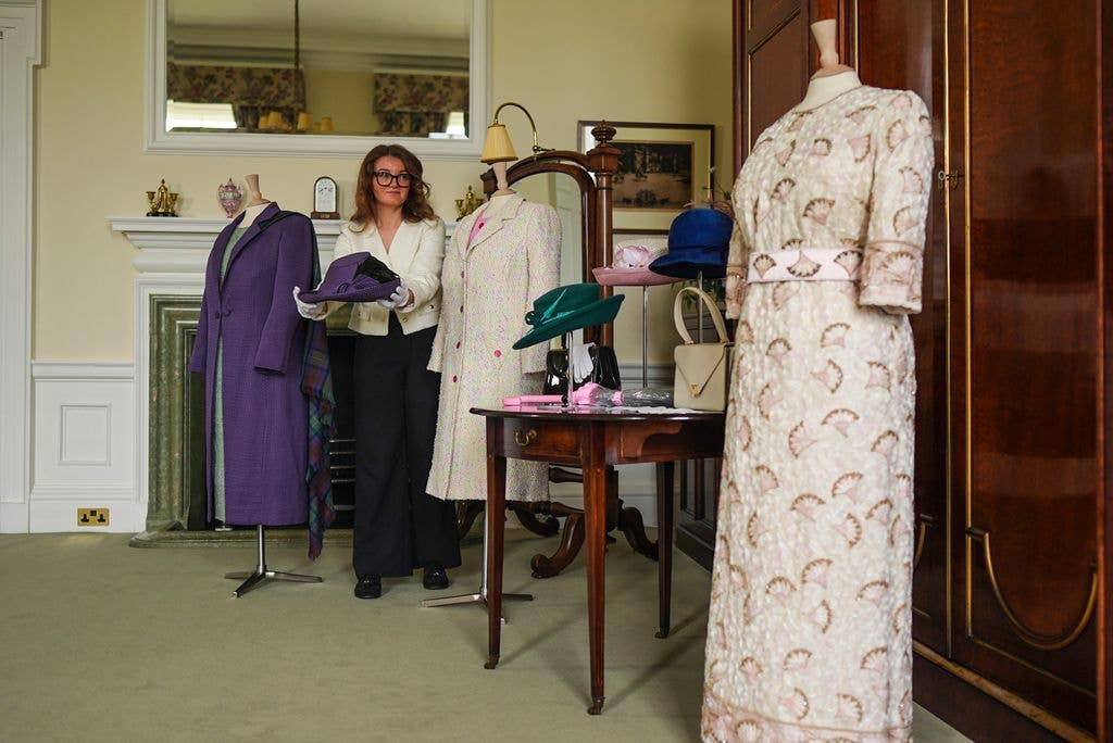 woman curating exhibit