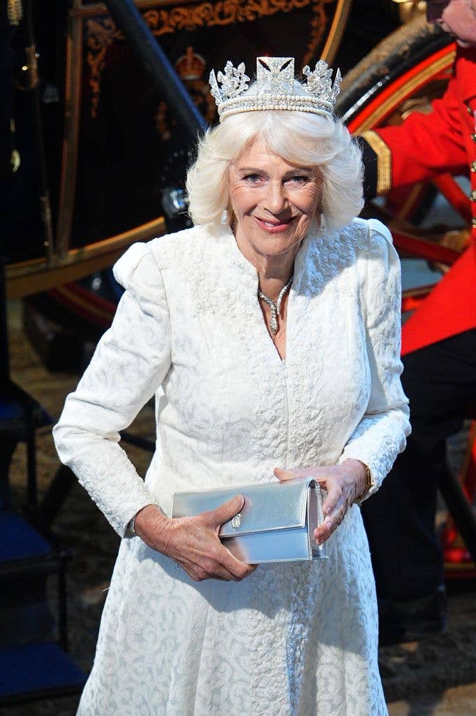 Queen Camilla in white dress and tiara