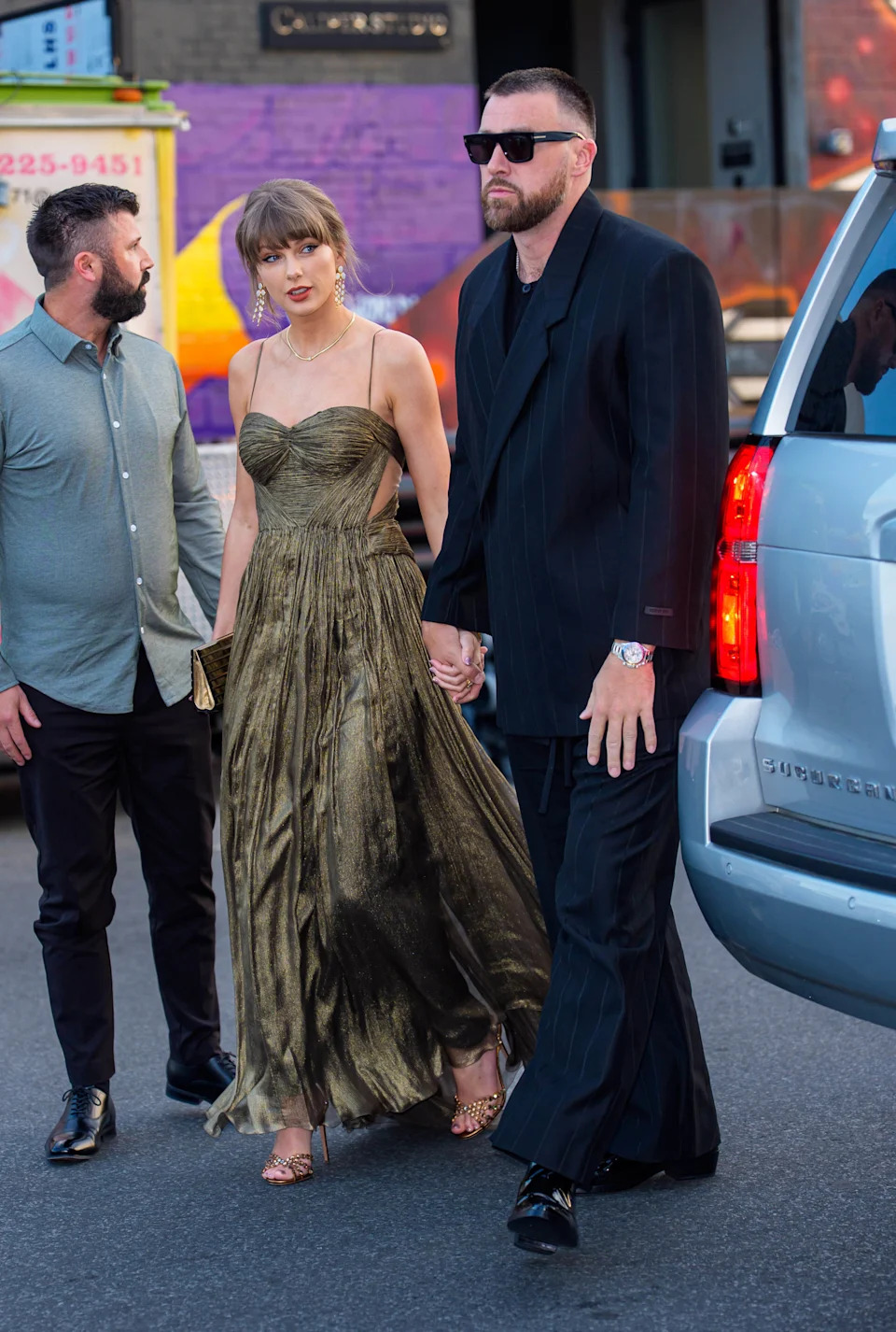 Swift stunned in a gold Maria Lucia Hohan gown and Aquazzura sandals (as seen above). GC Images