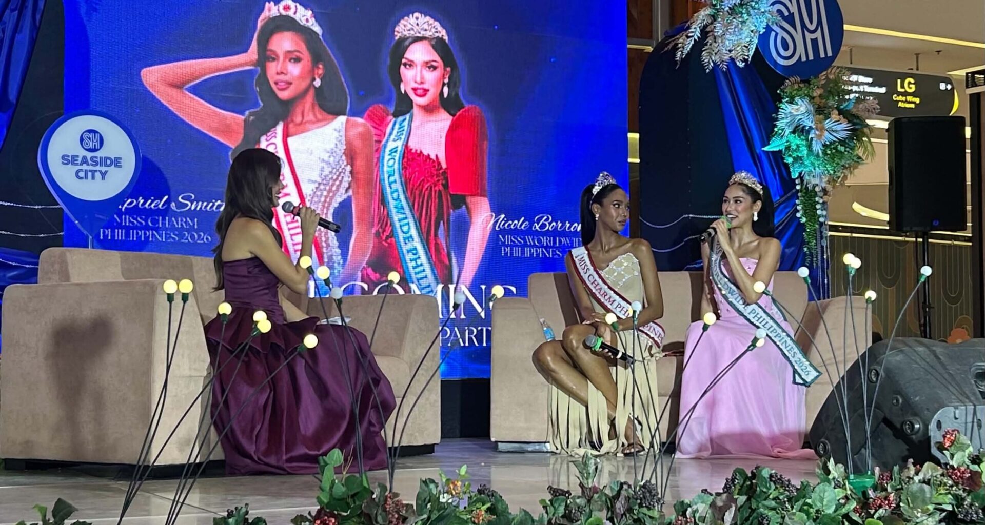 Queens Apriel Smith, Nicole Borromeo return to warm welcome