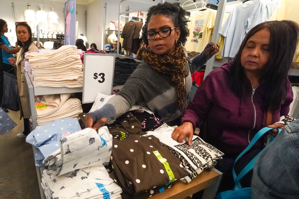 Customers shopping for clothes at the Primark store opening.