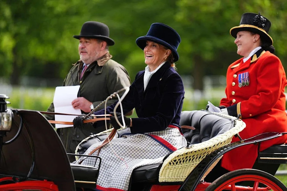 The Duchess of Edinburgh riding a carriage