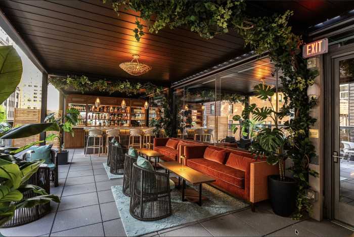 Dear Irving on Broadway combines expertly crafted cocktails with rich, art deco decor and outdoor seating for an upscale rooftop experience in the theater district.