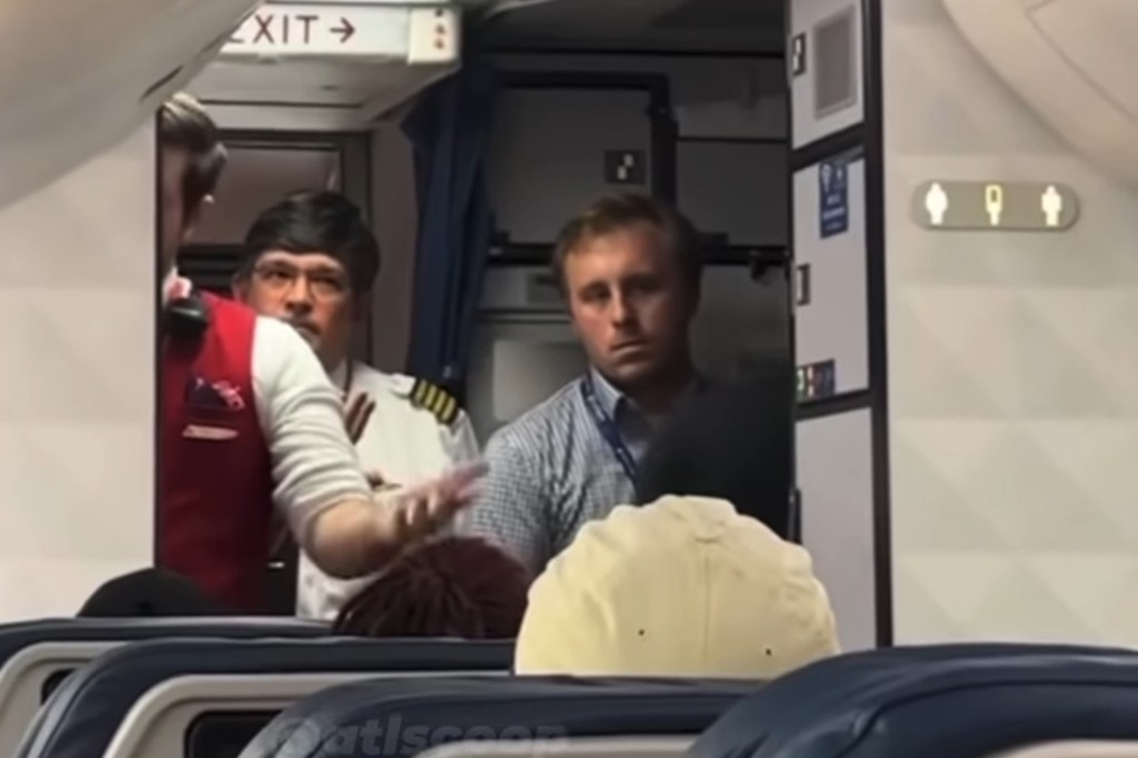 Passengers began chanting "get off the plane."