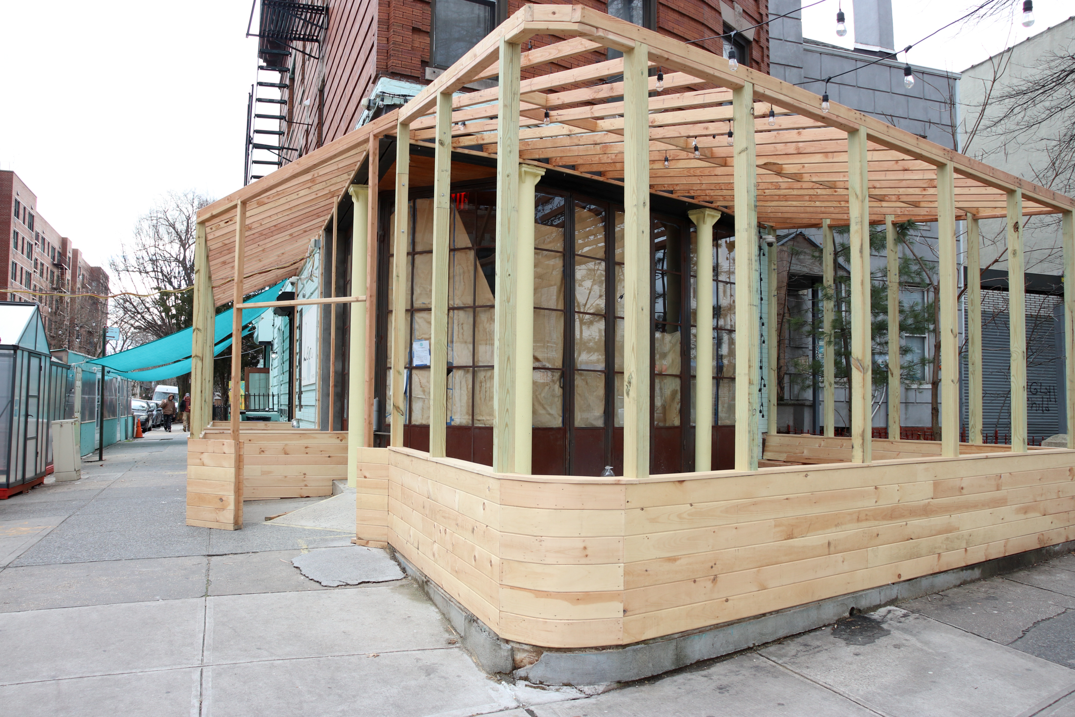 outdoor dining  area in front of restaurant under construction