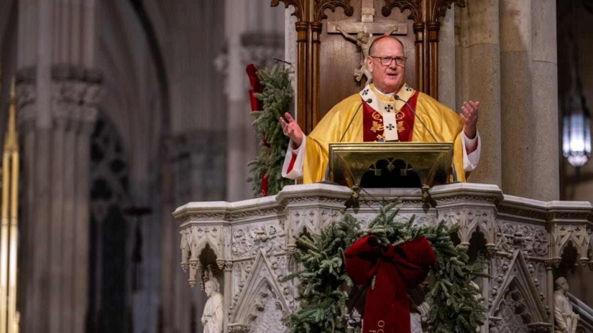 Cardinal Timothy Dolan celebrating Midnight Mass at St. Patrick’s Cathedral in New York City