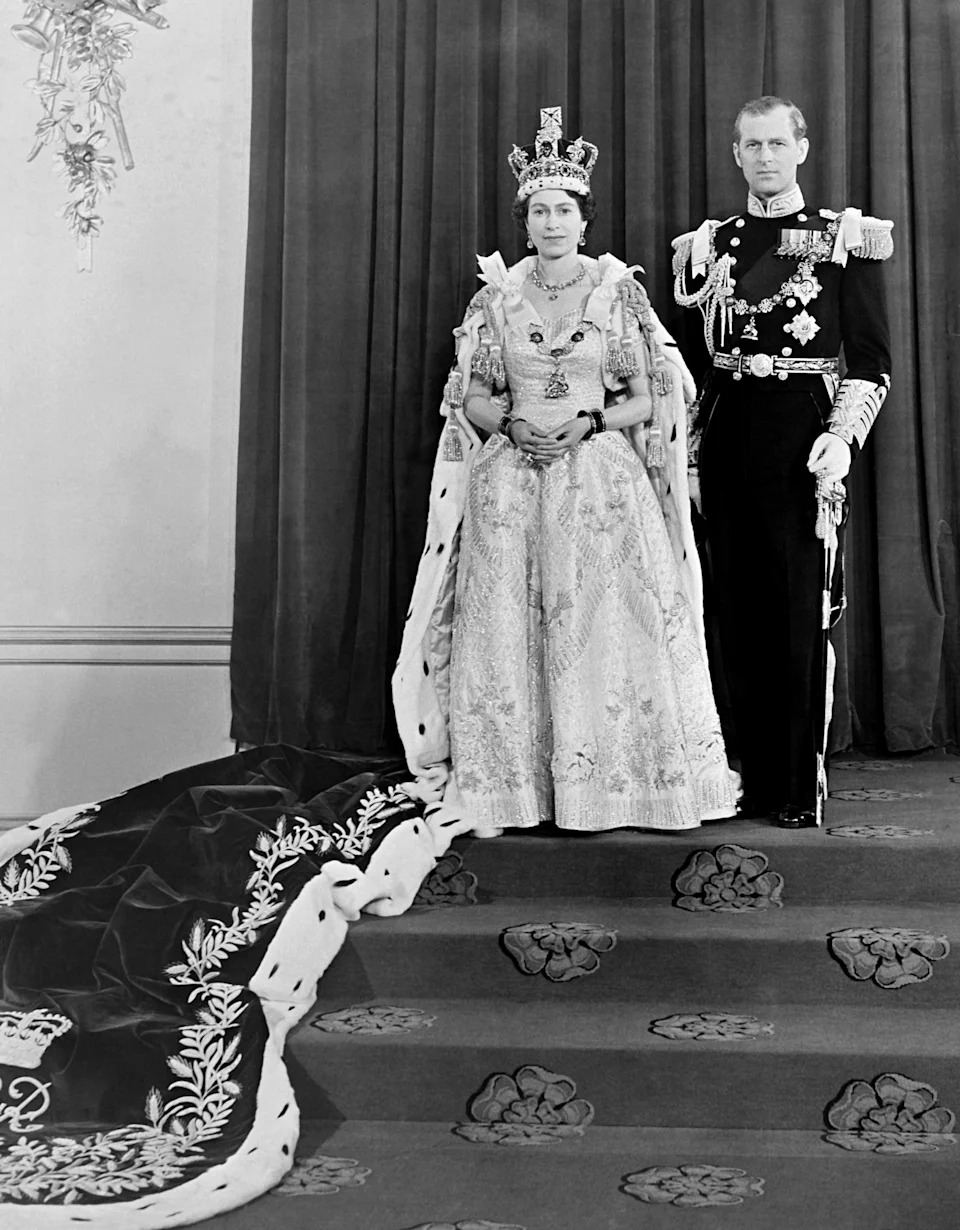 Queen Elizabeth II and her husband the Duke of Edinburgh at Buckingham Palace after her coronation in Westminster Abbey