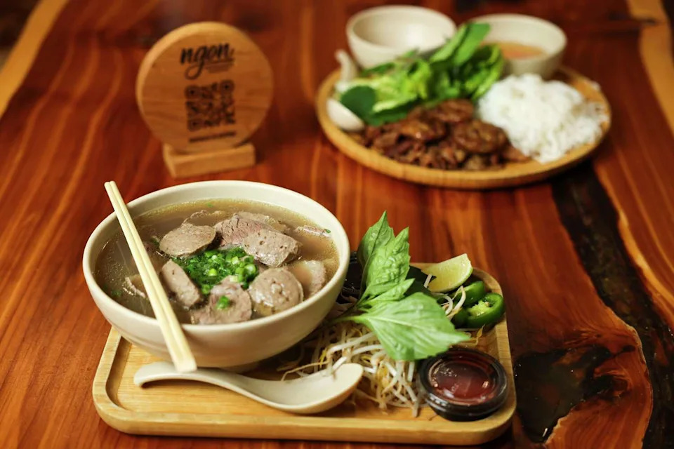 Ngon Vietnamese Kitchen's menu includes a variety of pho. The restaurant earned a Bib Gourmand, Michelin's award for reasonably priced food. (Shafkat Anowar/Staff Photographer)