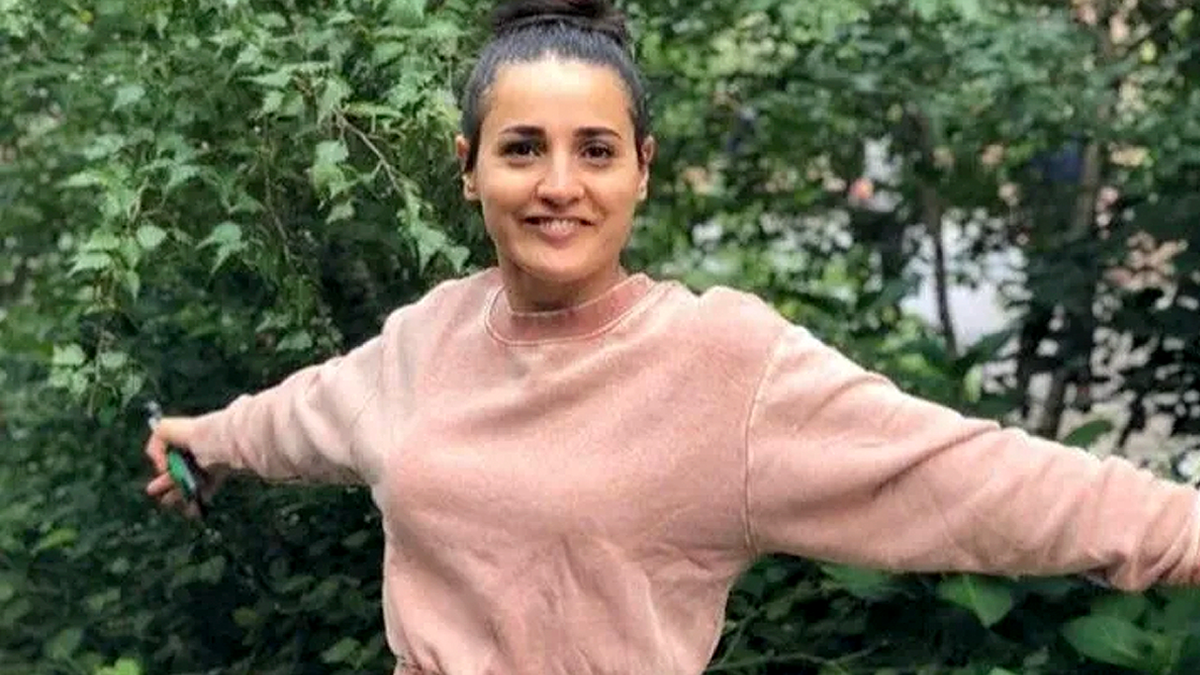Emine Yilmaz Ozsoy smiling outdoors before NYC subway attack that left her paralyzed
