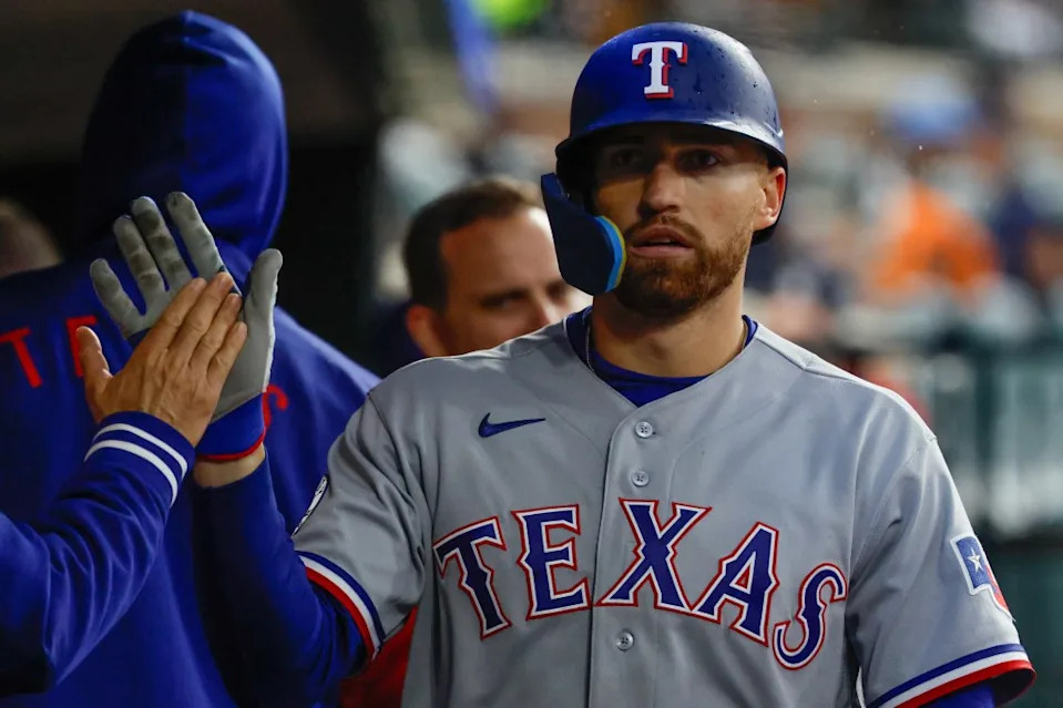 TBrandon Nimmo receives congratulations from teammates after scoring a run against the Tigers at Comerica Park earlier in the season. Rick Osentoski-Imagn Images