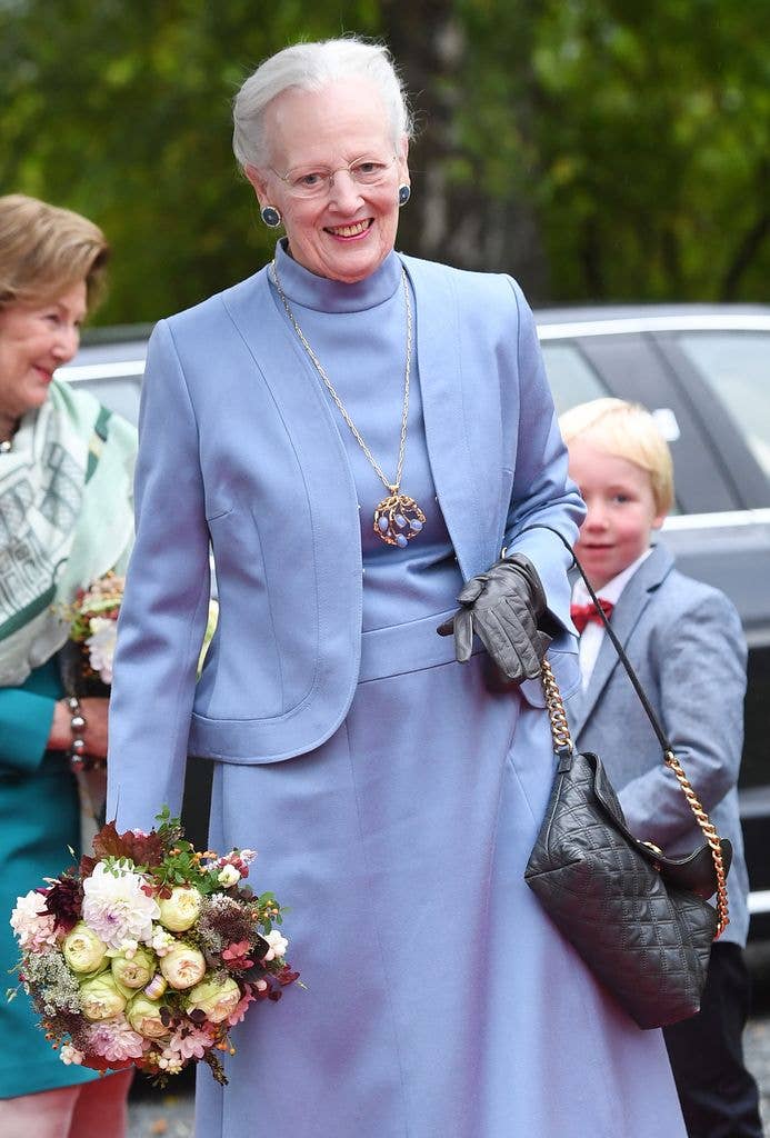 Queen Magrethe wearing blue outfit