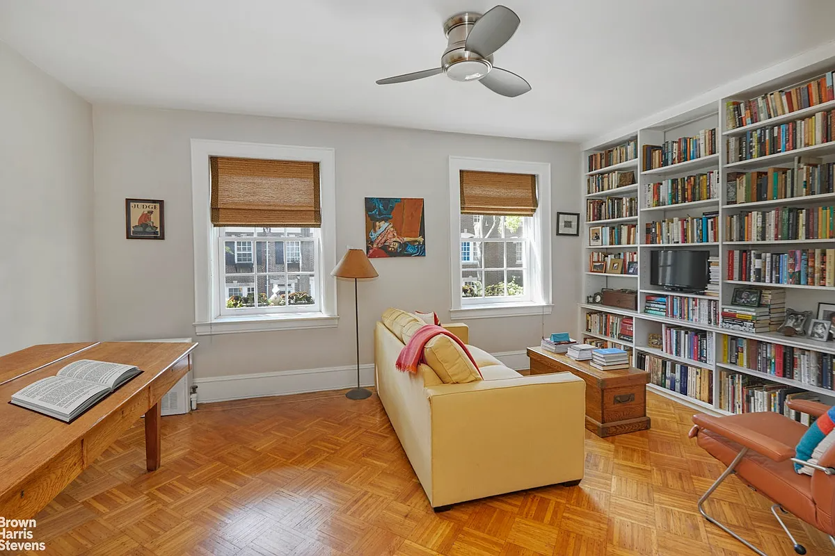 bedroom as an office with wood floor