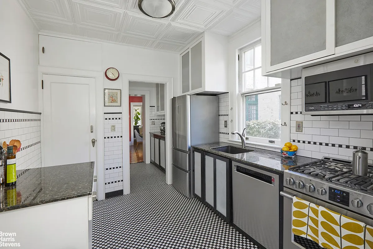 kitchen with black and white tile floor