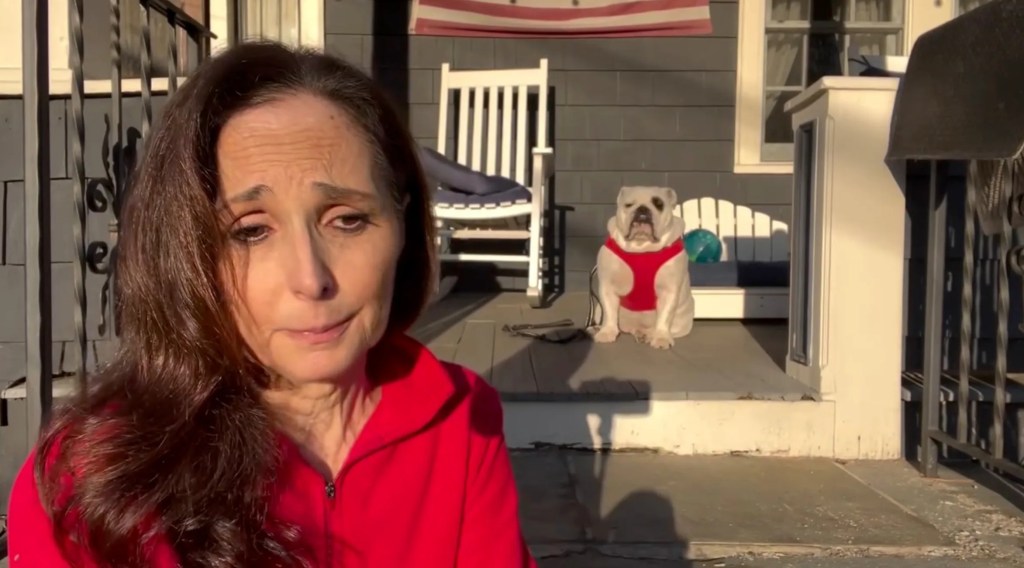 Former news anchor Amy McGorry with her bulldog on a porch, issuing a plea for a liver donor.