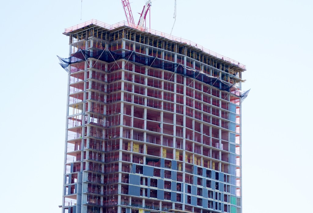 A high-rise apartment building under construction in the Bronx, New York City.
