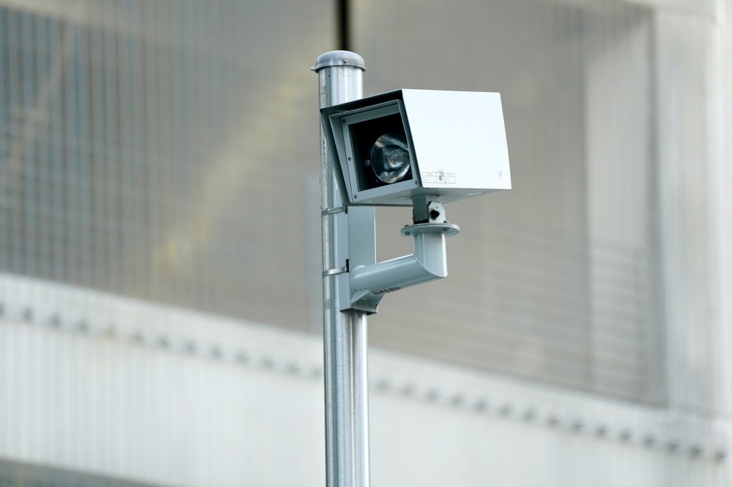 A speed camera mounted on a pole in the Bronx, NYC.