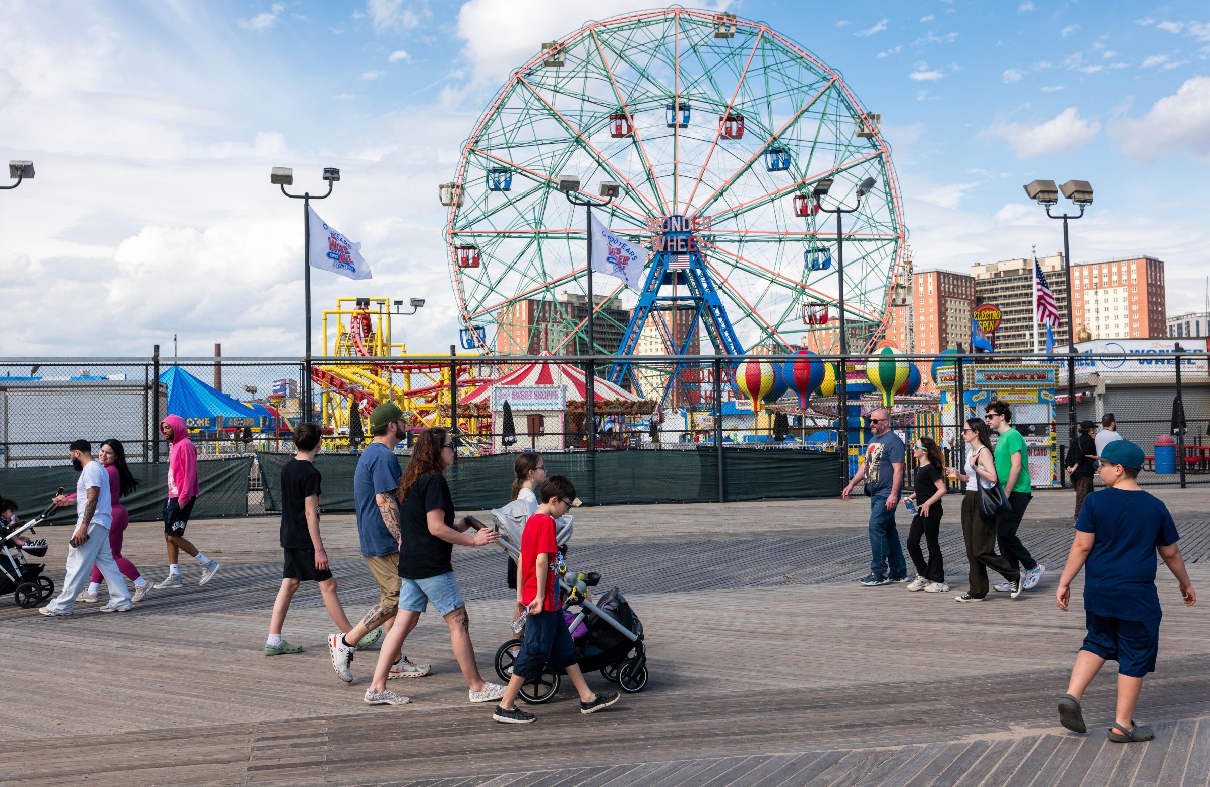 NEW YORK, NEW YORK - APRIL 01: People enjoy a warm Spring afternoon at Coney Island in Brooklyn on April 01, 2026 in New York City. Coney Island, one of the nation’s oldest beach and amusement park communities, saw both Luna Park and Deno’s Wonder Wheel Amusement Park hold opening ceremonies last weekend as the area prepares for the busy beach season. (Photo by Spencer Platt/Getty Images)