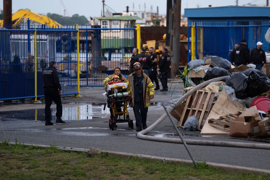 Firefighters and emergency crews responded to an explosion and fire at a shipyard on Staten Island, New York, on. Friday.